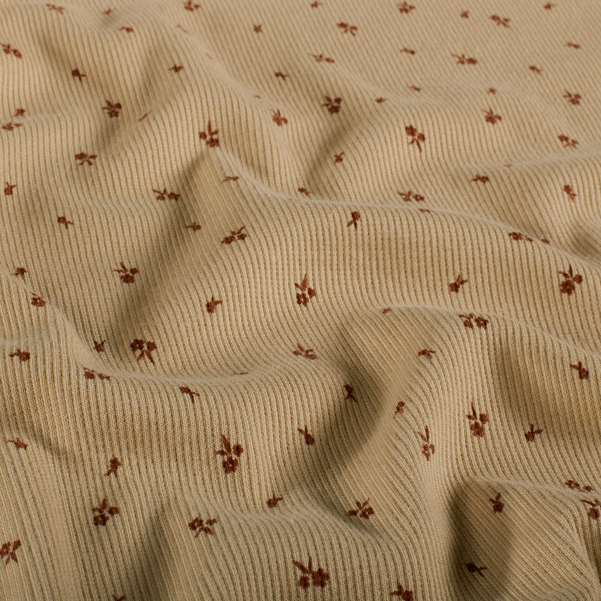 25443.052 RIB JERSEY STOF BEDRUKT BLOEMEN  - BEIGE