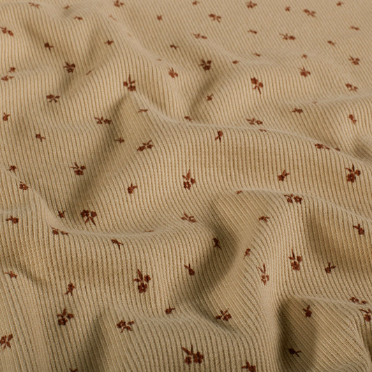 25443.052 RIB JERSEY STOF BEDRUKT BLOEMEN  - BEIGE